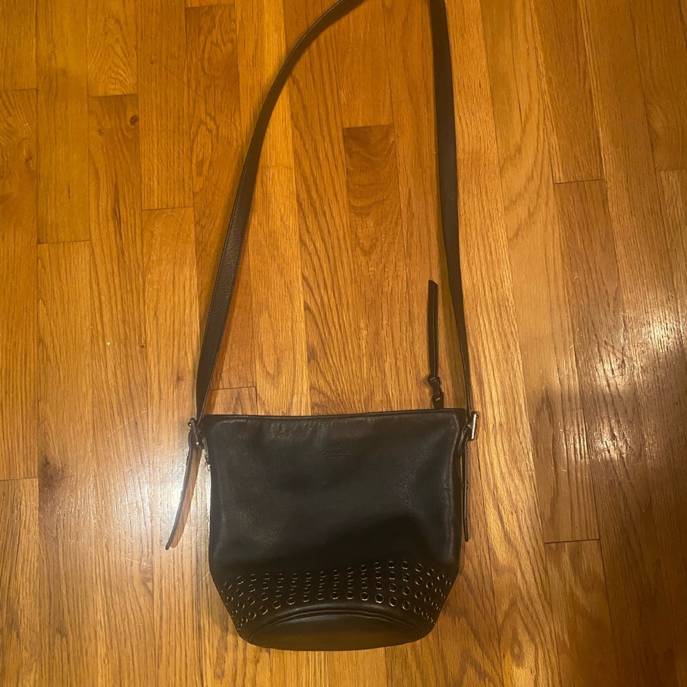 Coach black bucket bag with grommets